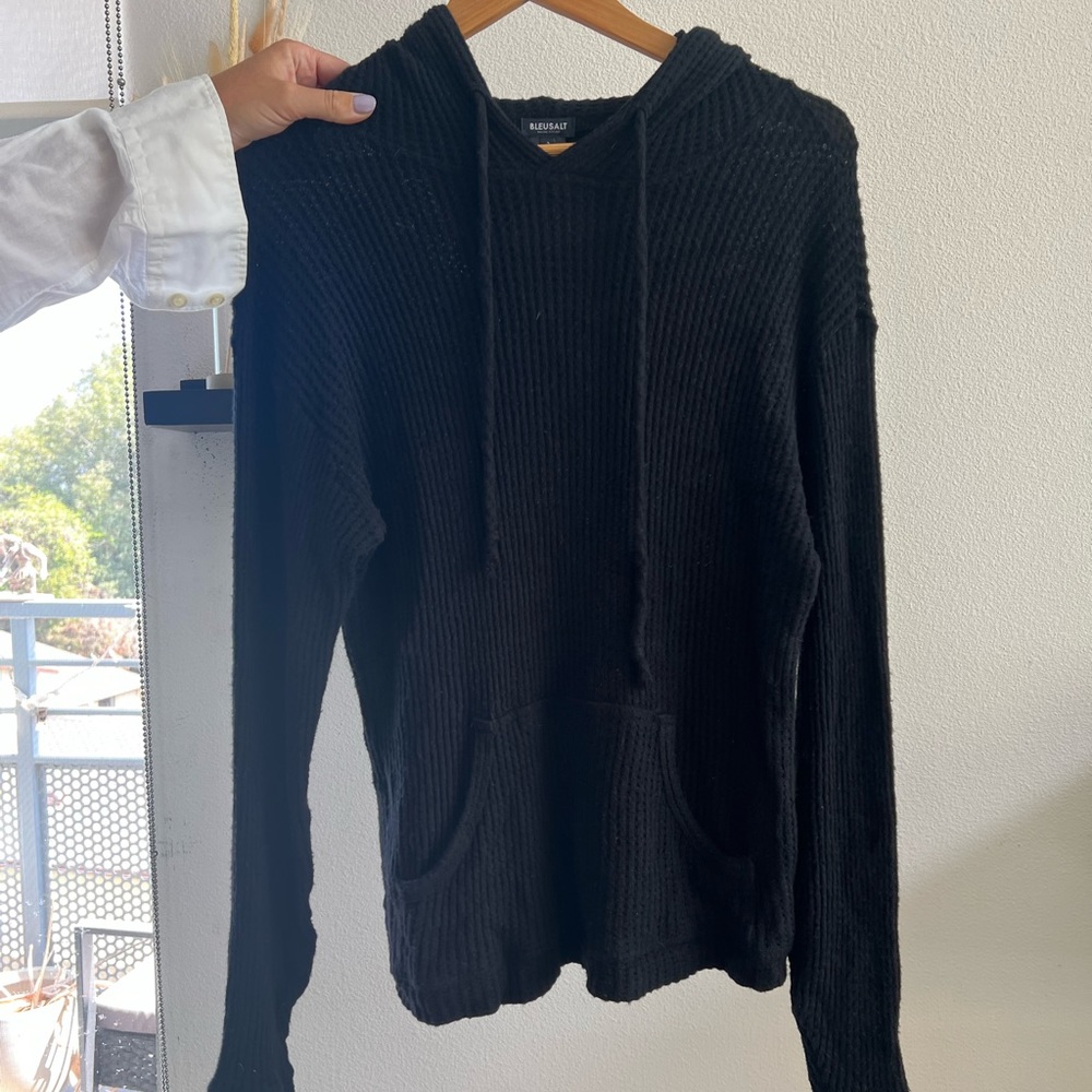 BleuSalt Black Top. Sweater feel with a hoodie design. Brand from Malibu, CA.